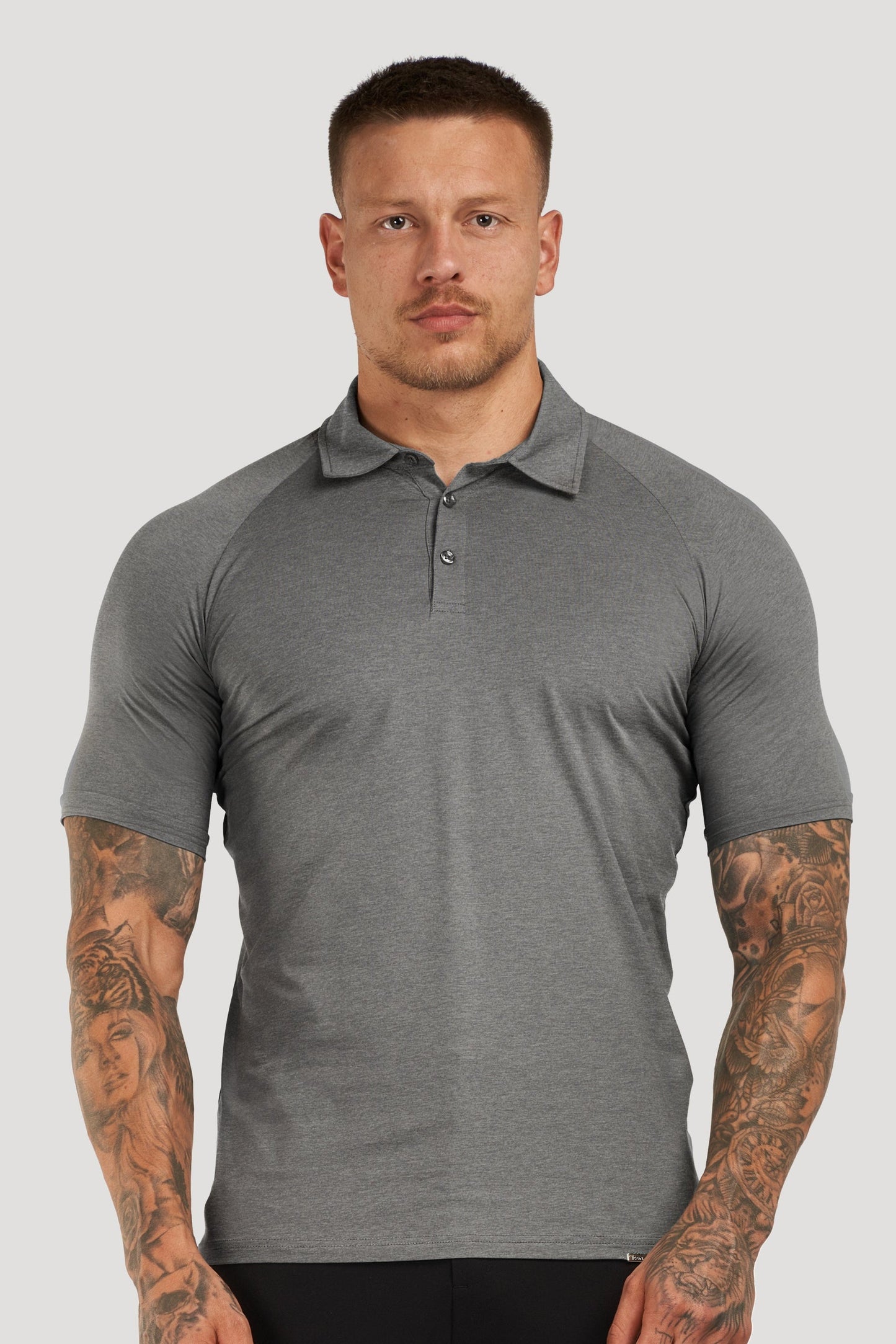 THE MUSCLE BUTTON POLO